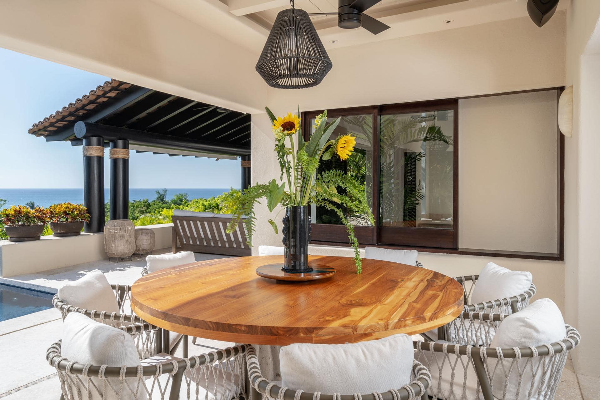 round tables, ocean view, flower painting, punta mita luxury rentals, punta mita